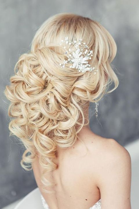 heavenly half up half down curls with a sparkling headpiece