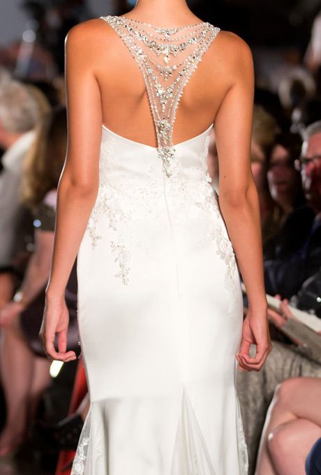 chic fit and flare wedding dress with a jeweled racerback