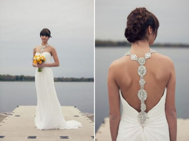 strapless wedding dress with a jeweled racerback showing up on the front as an accessory