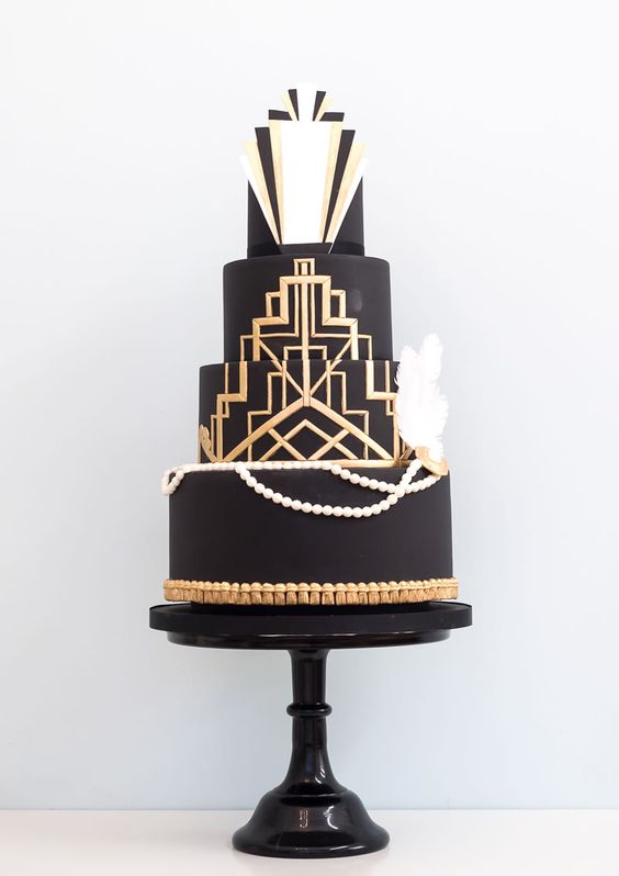 ein schickes schwarz, gold und weiße Hochzeitstorte mit gold geo-Dekor, essbare Perlen und Federn