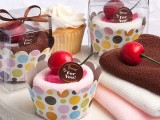 fun spa bridal shower gifts – cupcakes made of towels and topped with cherries look super cute