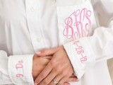 a white shirt with pink embroidered monograms to personalize your partner’s shirt for your bridal morning