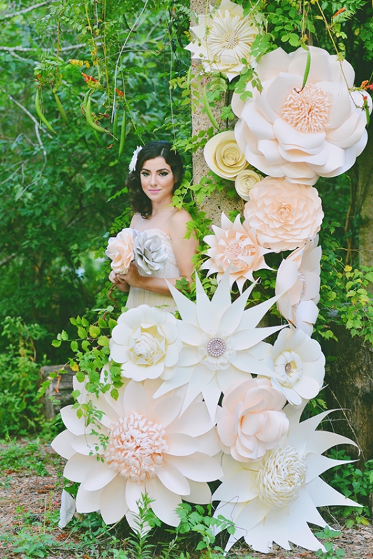 beautiful blush paper flower decor made of various oversized blooms attached to the tree is a cool and lovely decor solution to DIY