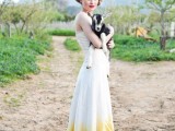 a strapless wedding dress with a dip dye yellow skirt for a bold colorful statement at the wedding