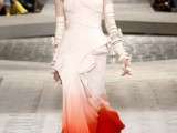 a creative strapless wedding dress with ties and ruffles and with a dip dye skirt in red is a wow statement