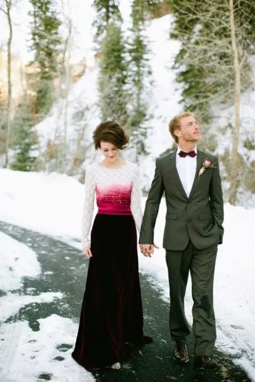 a dip dye wedding dress with a lace white and pink top and a burgundy velvet skirt is a bold idea for a Valentine's Day wedding