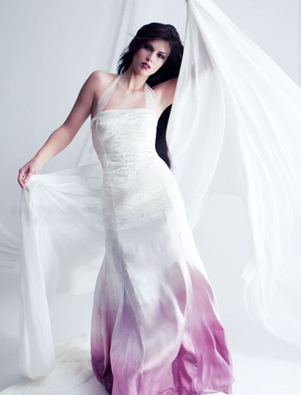 A strap wedding dress with a dip dye pink skirt is a bold idea for a bride who wants to look different