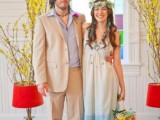 a creative dip dye blue wedding dress plus a necklace and a floral crown for a lovely boho bridal look