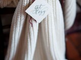 cover the chairs with knit covers and tags instead of usual covers and signs to give your venue a boho feel