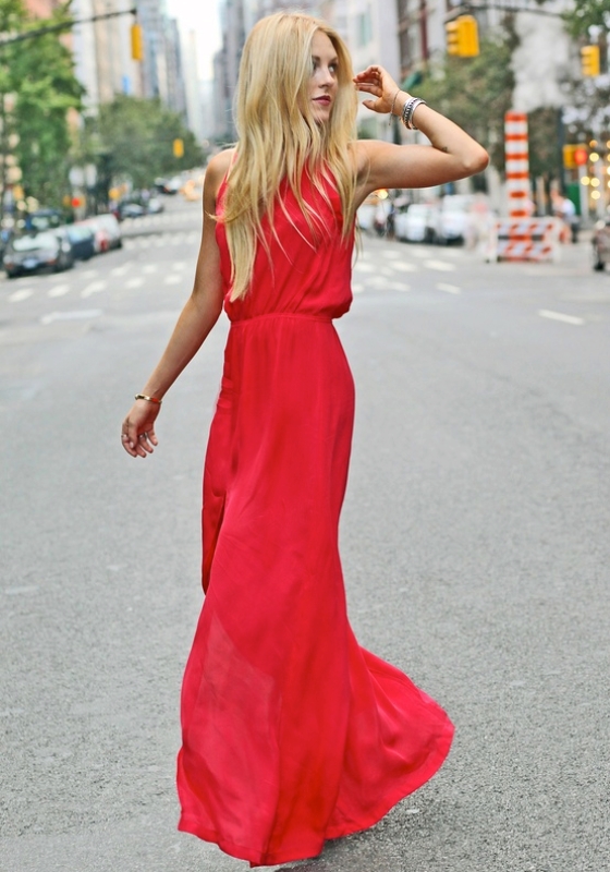 A hot red sleeveless maxi dress with a front slit is a gorgeous way to stand out