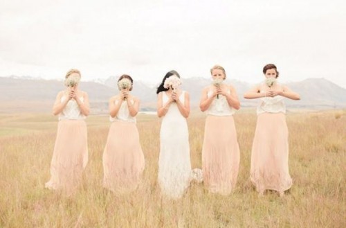 white plain and lace tops and blush plain maxi skirts create a very delicate and chic bridesmaid look that wows