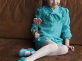 a blue dress with flower detailing, white tights, blue shoes for a chic and stylish winter flower girl outfit