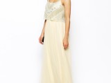 a romantic look with an embellished crop top, a neutral high waist skirt and silver shoes