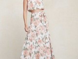 a floral outfit with a halter neckline crop top and a maxi skirt for a spring or summer wedding