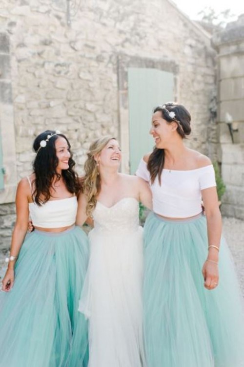mint tulle maxi skirts paired with mismatching white crop tops look bold and fun and fit spring or summer weddings