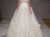 a refined strapless wedding ballgown with petal appliques on the skirt rim and a bit on the bodice is a chic and refined idea