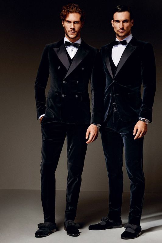 Navy velvet tuxedos with black lapels, waistcoats, bow ties and shoes with bows on them