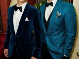 a gorgeous bright blue velvet suit with a black bow tie and a pocket square is a chic and glam idea
