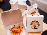 a mini pizzabar with pizzas in boxes that are wedding favors at the same time
