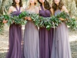 lovely and dreamy lilac and purple maxi bridesmaid with draped bodices and pleated skirts, with short trains and greenery bouquets