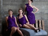 mismatching bright purple knee bridesmaid dresses and black shoes are a stylish and contrasting solution for a fall or winter wedding