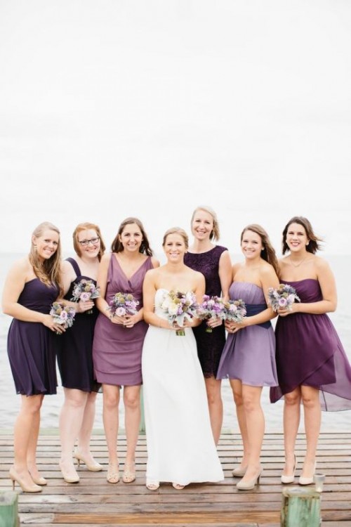 shades of purple mismatching bridesmaid knee dresses with various detailing and styling are amazing for a bold fall wedding