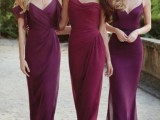 beautiful berry hued purple and fuchsia maxi bridesmaid dresses with mismatching necklines are amazing for a bold fall or winter wedding