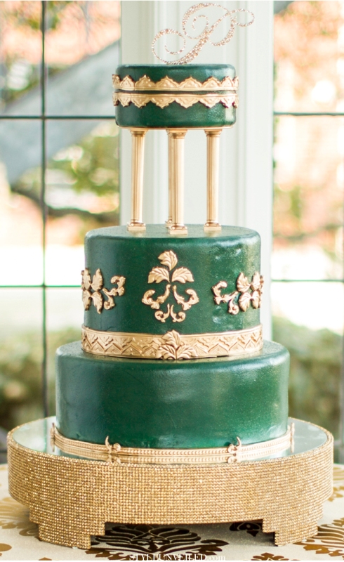 a gorgeous emerald and gold multi-tier wedding cake with refined detailing, with a chic vintage feel is ideal for an elegant or sophisticated wedding