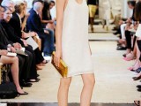 a white sequin slip mini dress paired with gold accessories is a lovely idea of a modern wedding dress or a getaway one