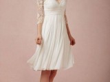 a simple A-line over the knee getaway dress with a V-neckline and short sleeves plus a pleated skirt for a retro-inspired wedding or a getaway