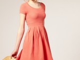 a simple coral pink A-line short bridesmaid dress is always a good idea for a relaxed bright wedding