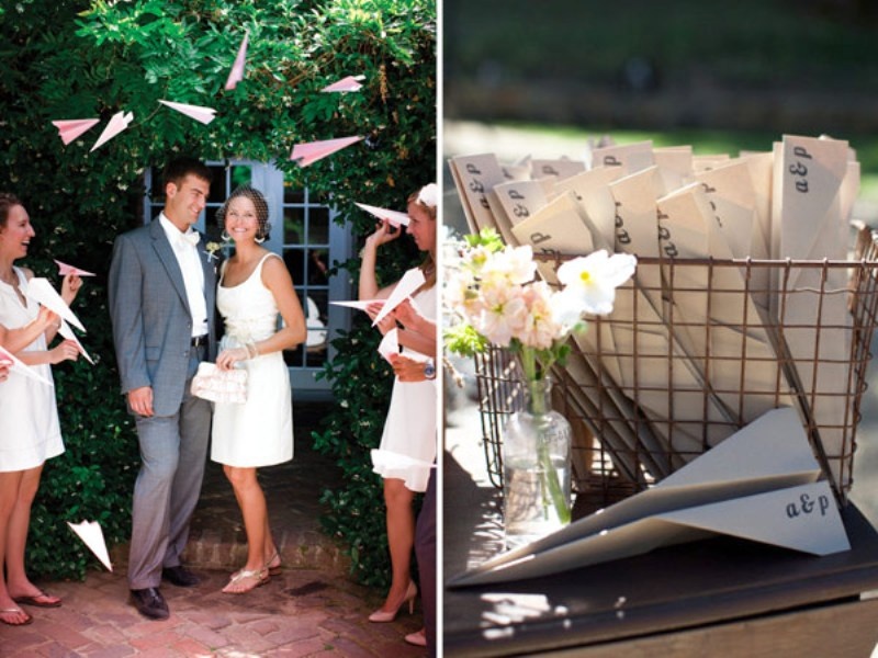 Monogrammed paper airplanes are great for a traveler's wedding or for a wedding of a pilot