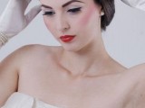 a small retro white hat inspired by the 40s and 50s is a lovely idea for a retro bridal look