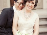 a long dark pixie with waves and a small and cute white birdcage veil is a cool idea for a vintage-infused wedding
