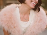 a short and dark wavy bob with a faux bloom as an accent is a beautiful idea for a vintage bride