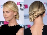 a chic braided side updo with a sleek top is a cool hairstyle for a bride who loves trends and wants to look edgy