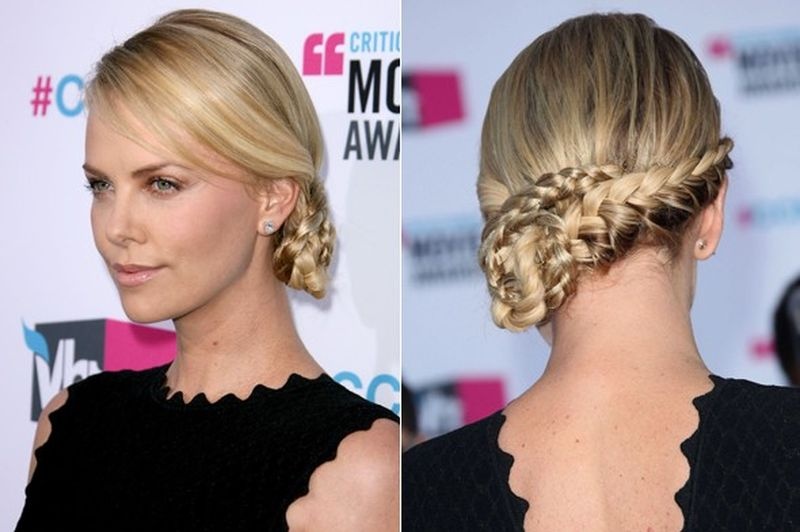 A chic braided side updo with a sleek top is a cool hairstyle for a bride who loves trends and wants to look edgy
