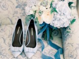 powder blue wedding shoes and a soft pastel wedding bouquet with powder blue blooms and a matching ribbon