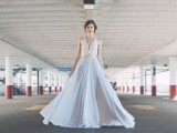 a wedding separate of a neutral lace sleeveless top and a powder blue A-line skirt with a slit