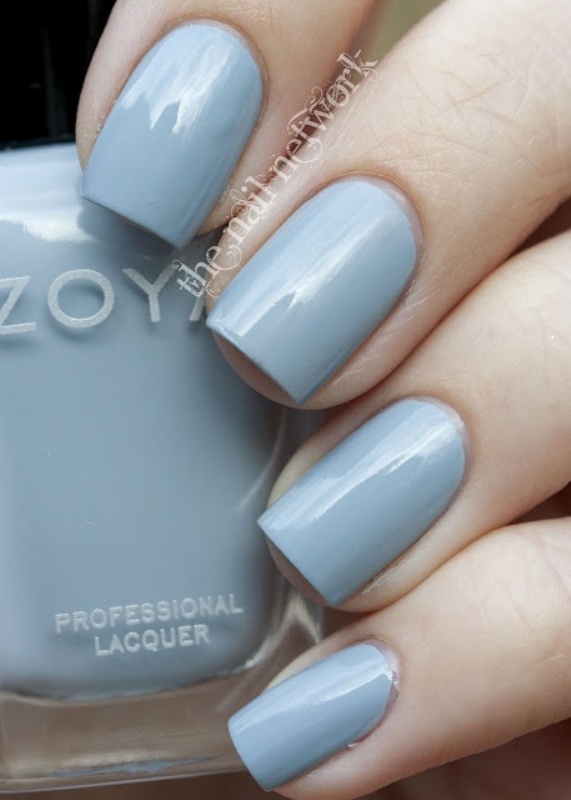 A powder blue manicure is a cool touch of color to your bridal look