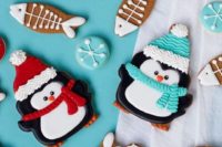 cute and fun penguin, snoflake and fish glazed cookies are super fun, super bright and can be given as favors