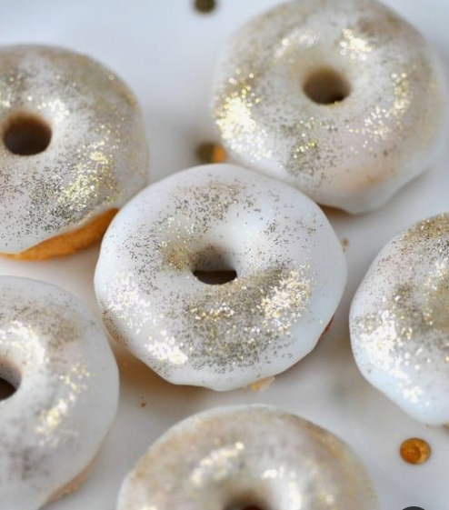 white glazed donuts with edible glitter is a cute and glam idea for a winter wedding