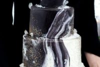 a black and white agate wedding cake with somem sugar crystals is a trendy wedding idea
