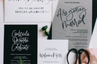 a chic black and white wedding invitation suite with calligraphy and sheer touches
