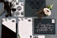 beautiful black and white wedding invitation suite with various prints and touches of black velvet