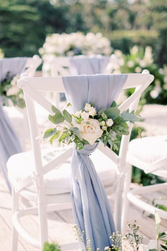 delicate and elegant dusty blue chiffon fabric accents with greenery and neutral blooms are amazing for a spring or summer wedding