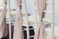 dusty pink fabric and pearl brooches will make the space very refined, chic and beautiful and will make it wow