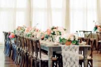 lace and peachy pastels softened up the rustic weathered tables