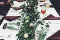long tables plus lush greenery and white bloom centerpieces for a chic modern look