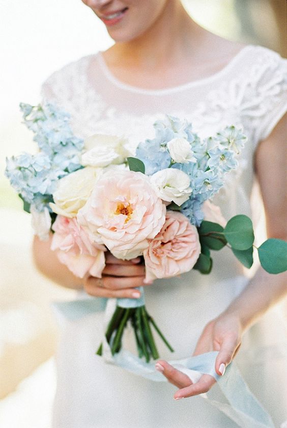 a blush, white and serenity blue wedding bouquet with just a touch of eucalyptus is chic